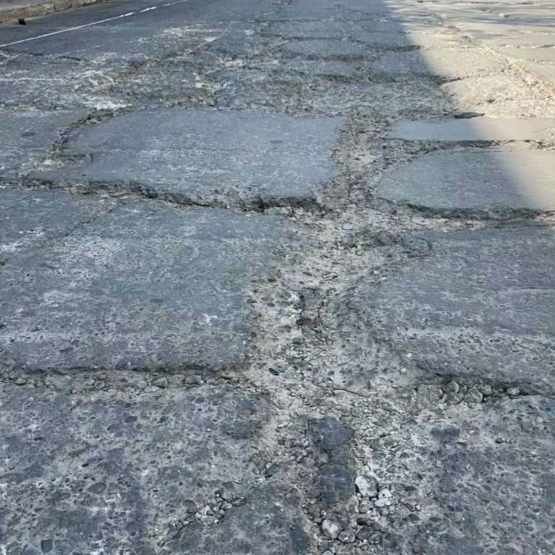 江川路面起砂露石子修补料